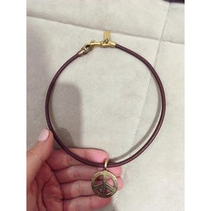 Gold Coach choker peace sign necklace